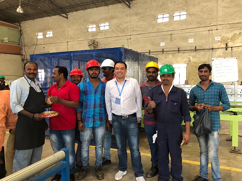 Taking photos with Indian ladder factory workers
