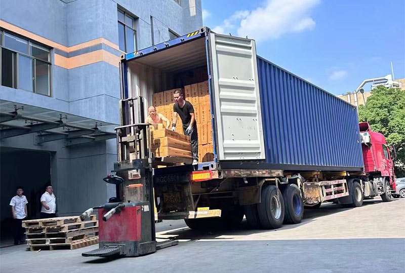 Ladder accessories and semi-finished products are being loaded into containers