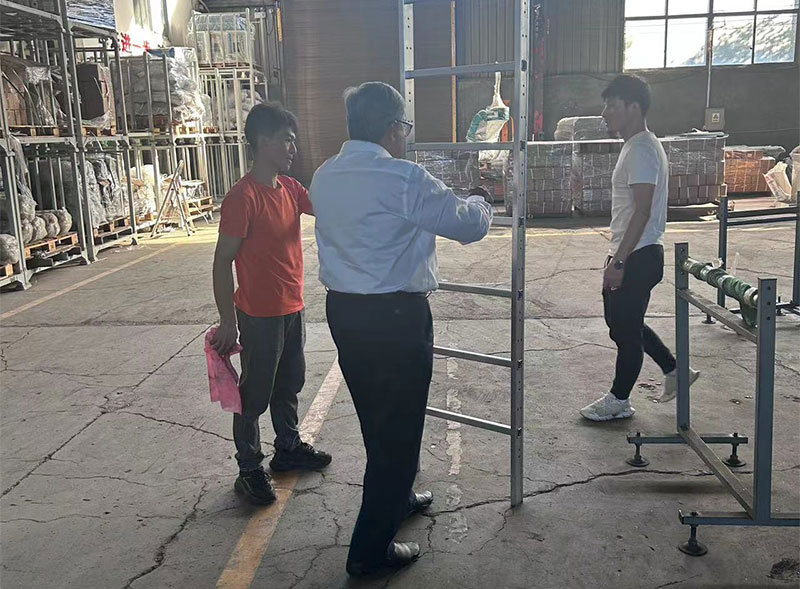 Indian customers inspect the newly made ladders